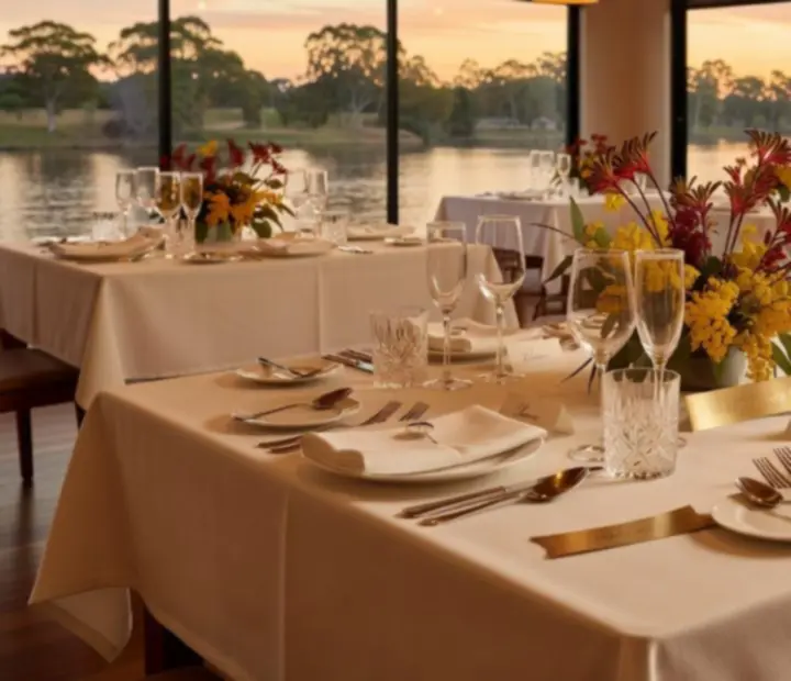 Celebration table setting with candles and seasonal flowers at Potand Platter